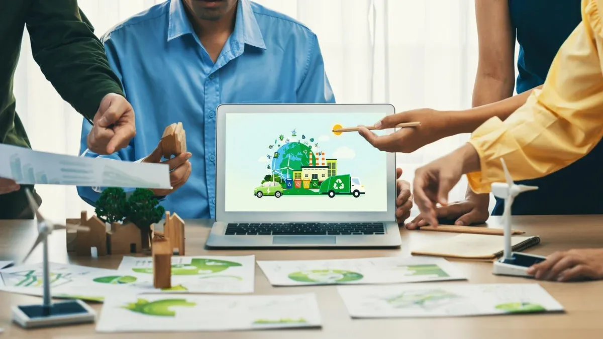 Une ville verte et une gestion des déchets illustrées sur un ordinateur portable Une équipe d'affaires présentant un design vert au client ESG environnement gouvernance sociale et concept écoconservateur Closeup Delineation