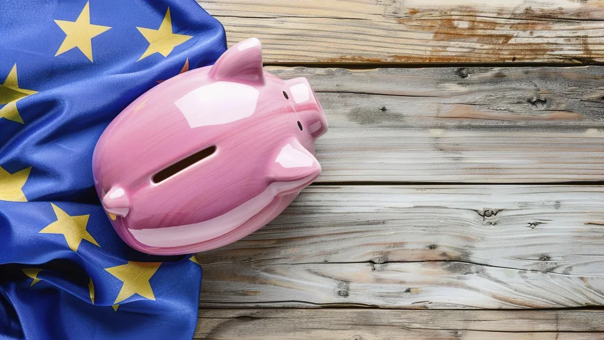 La tirelire rose et le drapeau de l'Union européenne